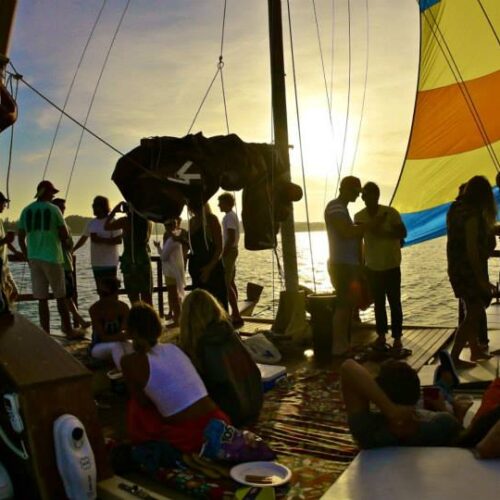 Softly into sunset under Mon Tiki's spinnaker